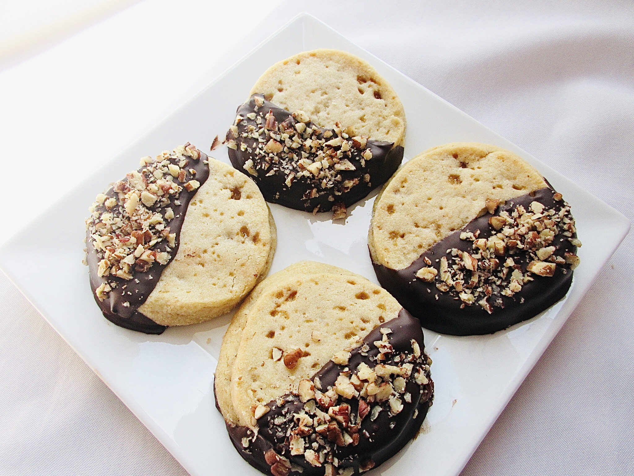 Shortbread cookies on a white plate.